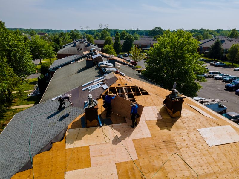 Roofing Team Installing Shingles